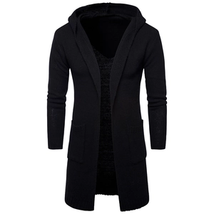 Detail of men's hooded knit cardigan showing front pockets and fine textured black fabric
