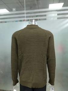 Detailed back view of men's olive green waffle knit sweater with ribbed cuffs