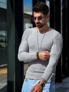 Detail of light grey slim fit sweater with waffle knit texture and ribbed shoulder details