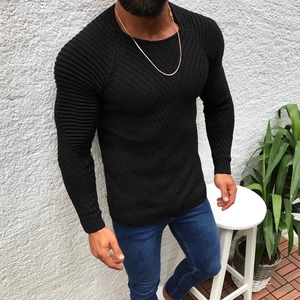 Men's slim-fit black long-sleeve knit sweater with crew neck and ribbed texture