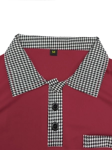 Detailed macro shot of polo shirt collar with houndstooth contrast and size M tag