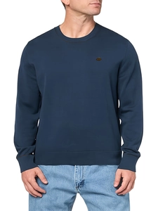 Detail of navy blue knit sweater with golden chest logo and ribbed crew neck collar