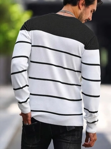 Detailed back view of striped color block knit sweater with black shoulder panels