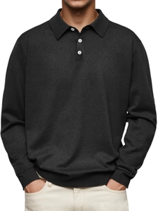 Close-up of charcoal grey knitted polo shirt showing fabric texture and button placket