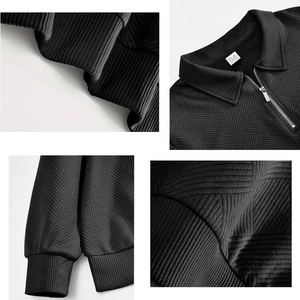 Detailed views of black waffle knit polo shirt showing half-zip collar and ribbed cuffs