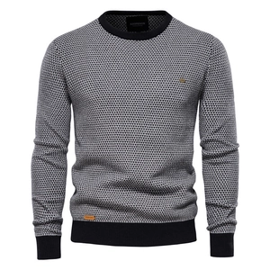 Men's khaki knit long sleeve crewneck sweater with textured honeycomb knit pattern