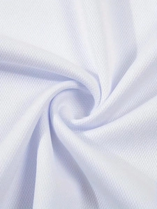 Close-up of white breathable honeycomb mesh fabric showing texture and soft drape