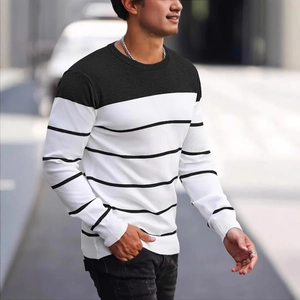 Men's stylish long-sleeved crewneck knit sweater with black and white striped color block design