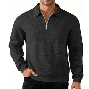 Men's American retro black 1/4 zip polo sweater with geometric textured knit pattern