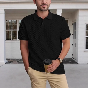 Men's black jacquard polo shirt featuring textured knit fabric and classic button placket