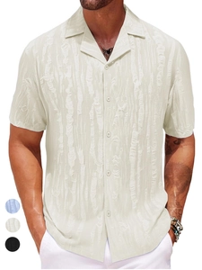 Detail of men's cream Cuban collar shirt showing vertical stripe textured fabric and buttons