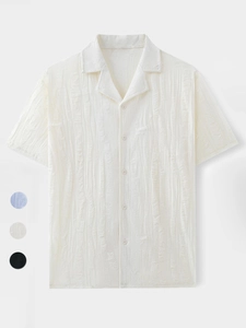 Detail of loose-fit Cuban collar shirt featuring unique vertical knit texture and color options