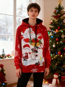 Loose Christmas hoodie with Santa and Snowman print in a festive indoor holiday setting