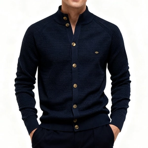 Detail of navy blue slim fit knit cardigan featuring stand collar and gold metal buttons