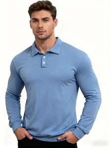 Detail of light blue long-sleeve polo shirt with classic three-button collar and slim fit cut