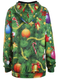 Detail of 3D digital Christmas tree print on festive oversized hooded sweatshirt