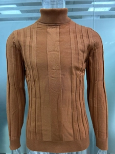 Close-up of caramel men's turtleneck sweater with vertical ribbed knit texture details