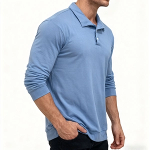 Detail view of light blue long-sleeved polo shirt with classic collar and ribbed cuffs