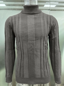 Macro detail of the men's turtle neck knit sweater featuring a vertical ribbed texture design
