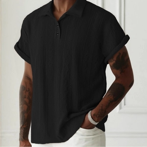 Polo noir en maille pour homme avec texture ajourée respirante à losanges