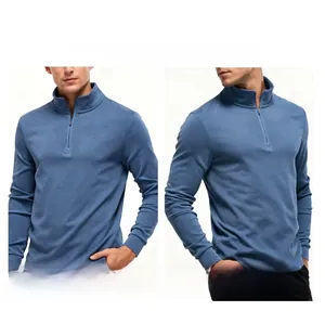 Close-up of haze blue thermal fleece sweatshirt featuring a half-zip stand collar