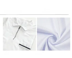 Détail du polo blanc en tissu respirant avec des rayures bleu marine sur la poche poitrine