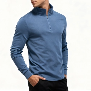 Detailed view of the fine zipper closure and stand-up collar on the blue men sweatshirt