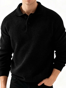 Men's black long sleeve waffle knit polo shirt with classic three-button collar design