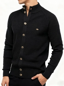 Men's black waffle-knit cardigan with a stand collar and button-front closure in slim fit