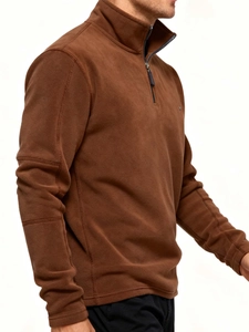 Detail of brown fleece pullover for men with standing collar and metal zipper finish