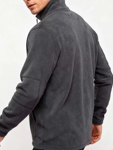Close-up of charcoal grey polar fleece sweatshirt with half-zip stand collar and stitching