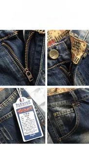 Vue détaillée de la fermeture éclair, du bouton mode et du denim vintage délavé