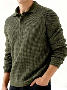 Detail of army green waffle knit polo sweater with ribbed cuffs and lapel collar