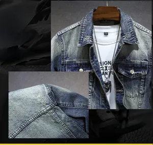 Detail of vintage denim jacket showing washed texture, pocket flaps and shoulder stitching