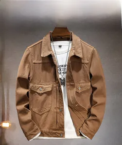 Front view of tan workwear jacket with multiple pockets and American vintage style