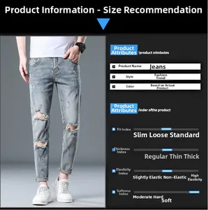 Detailed close-up of light blue distressed denim jeans with ripped details for men