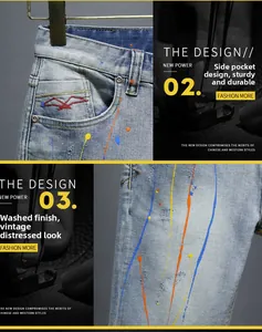 Detail view of light blue denim shorts featuring colorful paint splatters and red bird embroidery