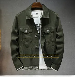 Detail of olive green denim jacket featuring classic collar and silver metal buttons