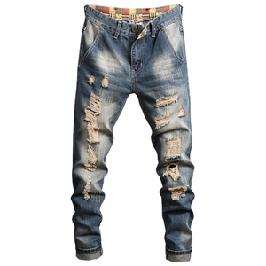 Men's retro distressed slim fit jeans with vintage wash and ripped denim details