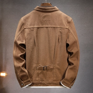 Vintage caramel canvas work jacket with functional cinch back and multi-pocket detail