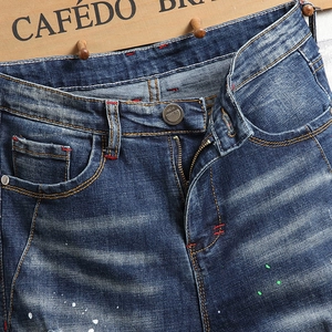 Men's slim fit stretch denim jeans with vintage wash and contrast red stitching details