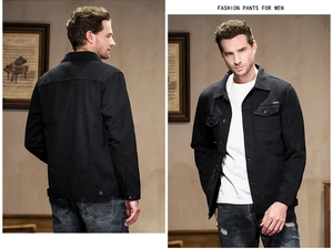 Classic black men's denim jacket with dual flap chest pockets and snap buttons