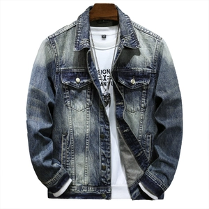 Vintage dark blue washed denim jacket with metal buttons and multiple utility pockets