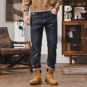 Men's deep blue vintage straight-fit jeans with cuffed hems and casual washed effect