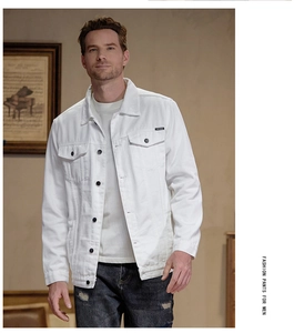 Close-up of white denim jacket with metal buttons and chest pocket label detail