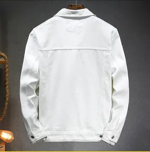 Detailed back view of a white denim jacket showing the yoke and adjustable waist tabs