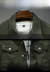 Detail of military green cargo jacket featuring notch lapel and metal buttons