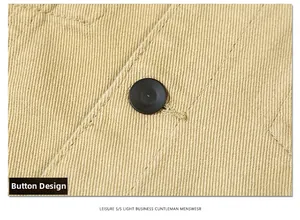 Detailed macro view of the khaki twill fabric and matte black button on a men's jacket