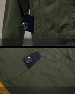 Detail of army green cargo jacket featuring reinforced stitching and spacious inner pockets