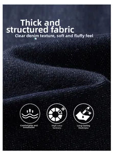 Macro view of dark blue denim fabric showing thick texture and durable twill weave